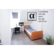 ALFA 2 Zimmer Apartment Mitarbeiter Monteure nahe Daimler Küche Netflix INET WM