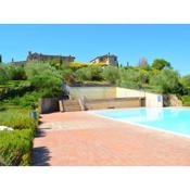 Apartment with 2 pools in the village of Asciano in the hills of Siena