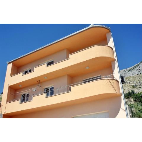 Apartments with a parking space Dugi Rat, Omis - 17287