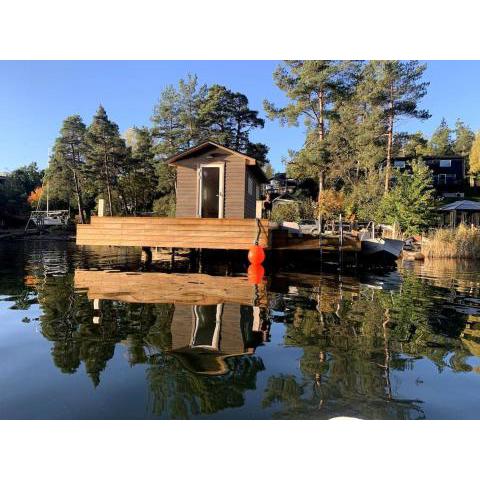 Beach house! Sauna pier & boat, near City