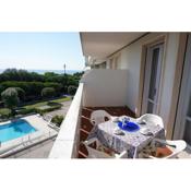 Beautiful Beachfront Apartment with Terrace Sea View and Swimming Pool