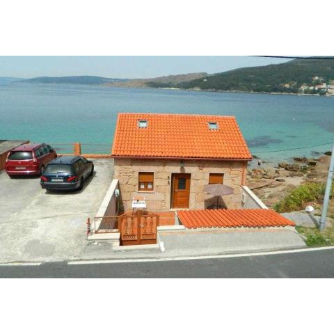 Casita con terraza al lado del mar en O Pindo