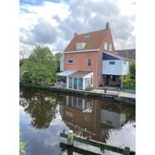 Characteristic detached house next to water