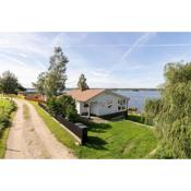 Cottage with its own sandy beach near Vimmerby