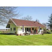 Detached house with large enclosed garden playground equipment and covered terrace