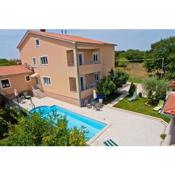 Family friendly apartments with a swimming pool Vinkuran, Pula - 7444
