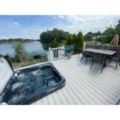 Lakeside Retreat 1 with hot tub, private fishing peg situated at Tattershall Lakes Country Park