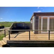 'Lauwers Loft' Holiday home 4 pers with lake view in front of the Lauwersmeer