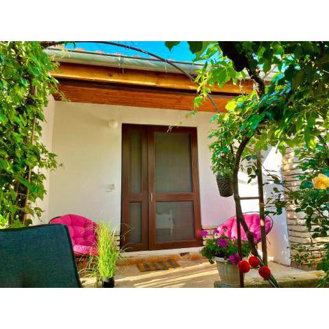 Lovely flower small house for two by the sea