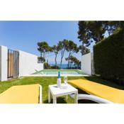Luxury villa in front of the beach ONA