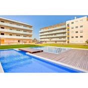 NEW! Apartamento con 2 piscinas, parque infantil, a 1 min de la playa