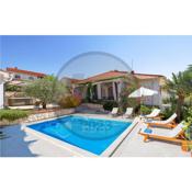 Nice home in Barbat with 4 Bedrooms, Jacuzzi and Heated swimming pool