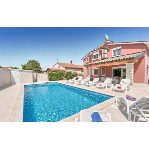 Nice home in Stinjan with 5 Bedrooms, WiFi and Outdoor swimming pool