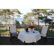 Panorama-Meerblick in der Villa Atlantic mit Strandkorb am Strand