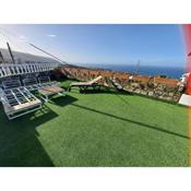 Tenerife apartment 100m2 CASA DE DON QUIJOTE with a terrace of 100m2 with a view of the ocean and Teide volcano and a garden of 600m2