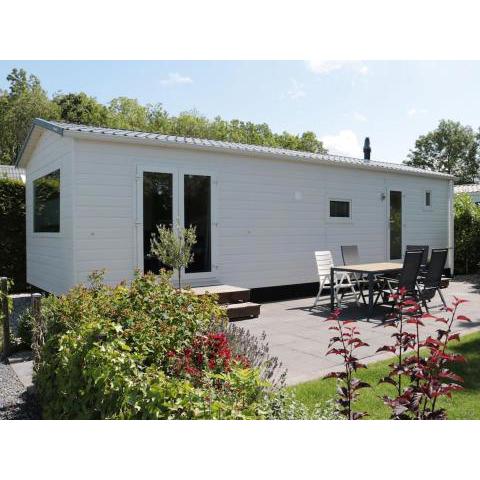 Tidy chalet with a microwave, near the Wadden Sea