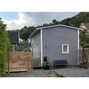 Tiny grey house with loft, 15 min from city center