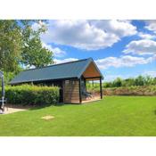 Tiny House with dishwasher, in a holiday park directly on a recreational lake