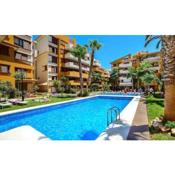 Turquesa Apartment,Punta Prima ,2 bed, 4 swimming pools and cabriolet Peugeot 307 included