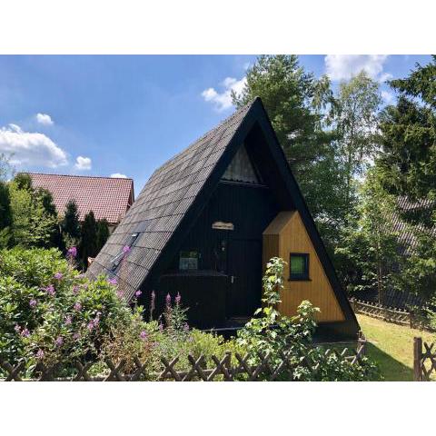 Wooden chalet with oven in Oberharz near a lake