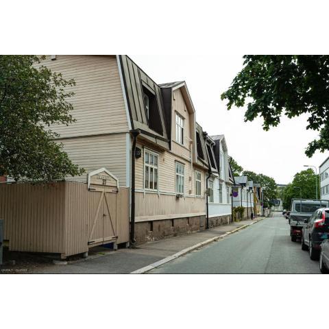 Wooden house studio with shared garden